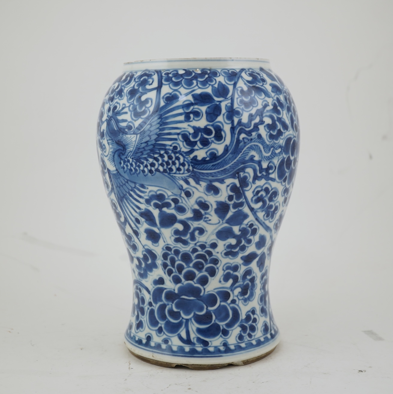 A Chinese blue and white ‘phoenix and peony’ baluster vase, Kangxi period